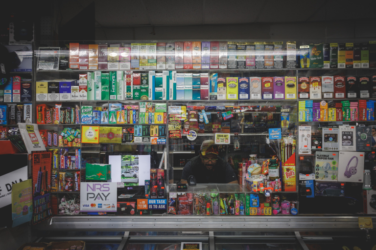 Store with a variety of tobacco products of all colors shapes and sizes.